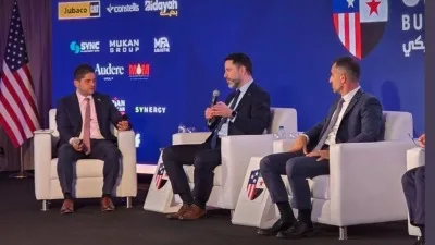 Central Bank of Syria Governor Safwat Raslan announcing new monetary policy at Syrian-American Business Forum in Damascus (sana)